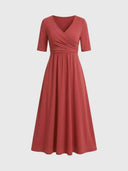 Rust red midi dress with V-neck, wrap bodice, and short sleeves, front view on white background.