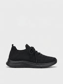 Supportive women's black knit lace-up trainer with black cushioned sole, angled side view on white background.