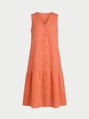 Orange sleeveless V-neck mini dress with front buttons and tiered skirt, front view.