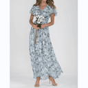 Light blue botanical print maxi dress with flutter sleeves, front view on white background.