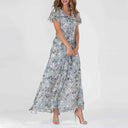 Light blue floral print maxi dress with flutter sleeves, front view on a light background.