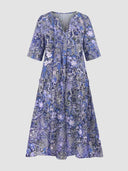 Blue and purple floral print mini dress with V-neck and short sleeves, front view.