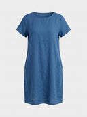 Blue linen mini dress with short sleeves and side pockets, front view.