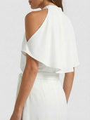 White halter neck dress with shoulder cut-out and waist tie, angled back view.