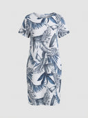 White mini dress with blue and grey tropical leaf print, short sleeves, and crew neck, front view.