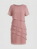 Pink mini dress with short sleeves and tiered ruffles, front view on a light background.