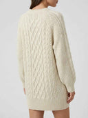 Cream knit mini dress with cable knit details, shown from the back on a white background.