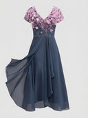 Navy maxi dress with pink floral top, V-neck, short sleeves, and flowing skirt, front view.