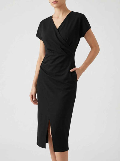 Black V-neck midi dress with cap sleeves, ruched waist, and side slit, angled front view.