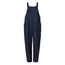 Navy blue jumpsuit with wide straps, front pockets, and loose fit, front view.