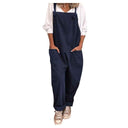 Navy blue loose jumpsuit with tie straps, large pockets, and rolled cuffs, front view.