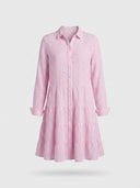 Pink and white striped mini dress with tiered skirt and long sleeves, front view.