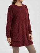 Burgundy fuzzy knit mini dress with patch pockets, angled front view.