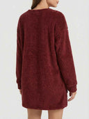 Burgundy fuzzy knit mini dress with long sleeves, shown from the back on a white background.