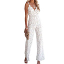 White lace jumpsuit with V-neck, spaghetti straps, and wide legs, front view on white background.