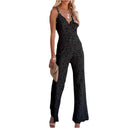 Black lace jumpsuit with V-neck, spaghetti straps, and wide legs, front view.