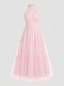 Pink halter neck maxi dress with tiered tulle skirt, front view on a light background.