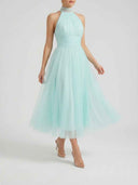 Aqua halter neck maxi dress with a flowing tulle skirt, front view.