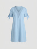 Light blue V-neck dress with crochet trim and tie sleeves, front view on a white background.