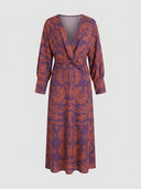 Purple maxi dress with orange floral print, V-neck, and twisted waist, front view.