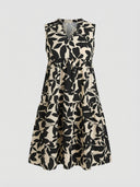 Sleeveless black and beige floral mini dress with V-neck and tiered skirt, front view.