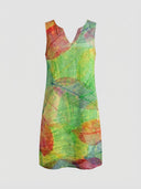 Green, red, and blue leaf print mini dress with a V-neck, front view on a white background.