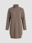 Taupe ribbed knit mini dress with turtleneck and buttons on sleeves, front view.