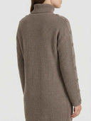 Taupe knit turtleneck mini dress with long sleeves and shoulder buttons, back view.