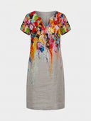 Gray mini dress with colorful abstract floral print on top, short sleeves, V-neck, front view.