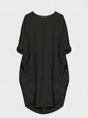 Black mini shirt dress with rolled sleeves, two large pockets, and a curved hem, front view.