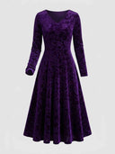 Purple velvet maxi dress with embossed floral pattern, front view on a white background.