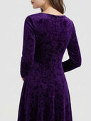 Purple velvet maxi dress with embossed floral pattern, back view.