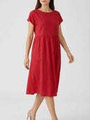 Red mini dress with short sleeves and gathered waist, angled view on white background.