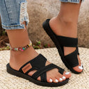 Black wide-strap arch support sandals with cushioned footbed, angled view worn on feet showing bunion-friendly open-toe fit.
