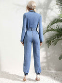 Light blue denim jumpsuit with waist belt and elastic cuffs, back view.