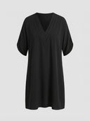 Black mini dress with pleated V-neck and short sleeves, front view on a white background.