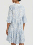 Viola boho mini dress in blue paisley damask print, back view showing tiered skirt and fluted 3/4 bell sleeves.