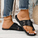 Black leather flat toe-ring sandal with rectangular buckle strap, clean side profile view.