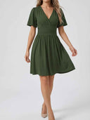 Olive green ruched V-neck mini dress with flutter sleeves, front view on a white background.
