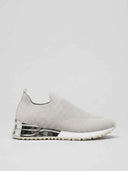 Light grey slip-on knit trainer with chrome silver heel accent and white non-slip rubber sole, side view.