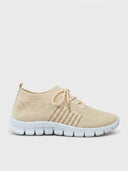 Beige mesh orthopaedic trainer with white lace-up fastening and cushioned sole, side view.