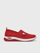Red knit slip-on trainer with cut-out strap detail, red accents and white chunky sole, side view.