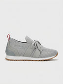 Grey mesh lace-up trainers with suede-look overlays, white cushioned midsole, and gum rubber outsole, side view on white background.