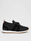 Ultralight black mesh lace-up trainers with suede-look overlays, white midsole, gum rubber outsole, and red heel pull-loop, side view.
