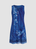 Blue sleeveless midi dress with white floral print, V-neck, and three white buttons, front view.