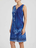 Blue floral sleeveless midi dress with white buttons, side view on white background.
