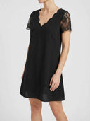 Black midi dress with scalloped V-neck and lace short sleeves, angled front view.